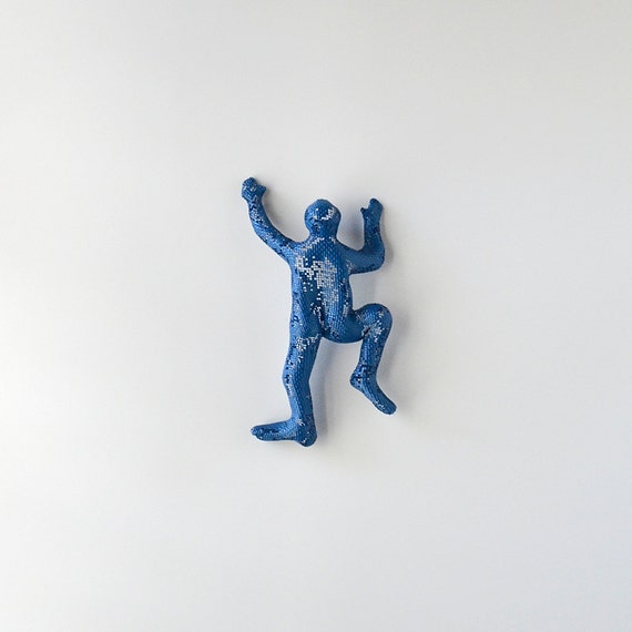 wall climbing figurines