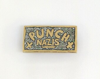 Punch Nazis Enamel Pin - black glitter enamel with gold details