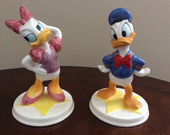 donald and daisy duck figurines