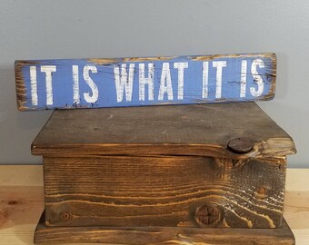 It Is What It Is, 3 1/2 x18 hand painted, distressed, wooden sign.