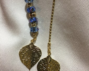 Blue beaded light and fan pull set with gold chains