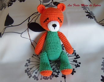 Orange and green crochet Teddy bear