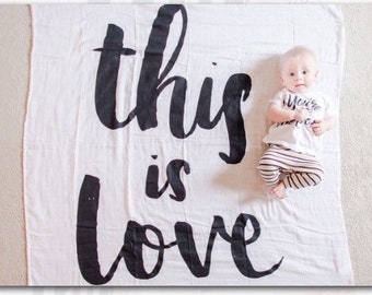 THIS IS LOVE muslin swaddle blanket, baby gift, newborn photo prop, one month old, I'm new here, hello world black and white blanket