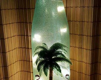 Palm tree lighted wine bottle