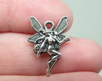 6 Silver Tone Pixie or Fairy Charms. B-008