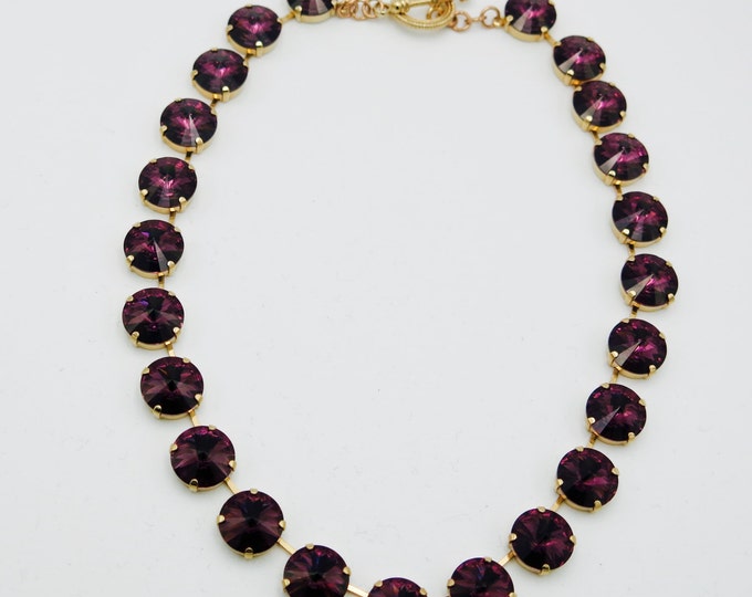 Have all eyes on you in this eye-catching 14mm rivoli Swarovski crystal amethyst purple collar necklace. Layer for a dramatic look!