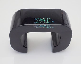 Superb black lucite art bracelet with real iridescent beetle