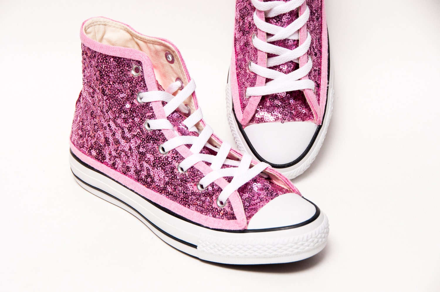 pink sparkly high top converse