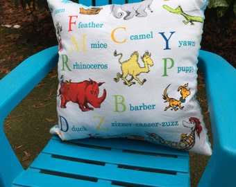 Child's Pillow - Dr. Seuss Tossed Characters on Cotton with Bright Blue Dimple Minky Back, 14" X 14"
