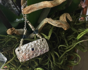 Silver and sapphire