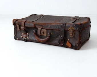 vintage leather suitcase, thick hide black luggage