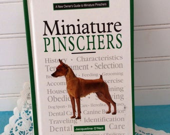 Dog Lover Gift Idea - Miniature Pinschers New Owners Guide - Jacqueline O'Neil author - hard cover with dust jacket - like new condition -