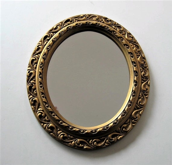 Vintage Oval gold framed Mirror Raised ornate scroll work