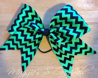 Cheer bow with neon green and black sparkle