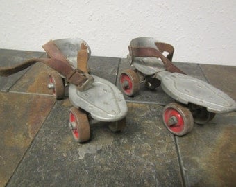 pair of old metal HUSTLER Speed King ROLLER SKATES ** Hustler corp. Sterling Illinois