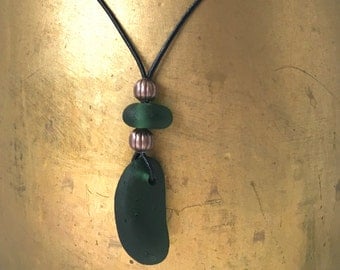 Green sea glass necklace, found beach glass pendant, handmade using black leather cord, ideal for a man or woman