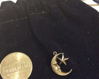 Silver half moon and star charm