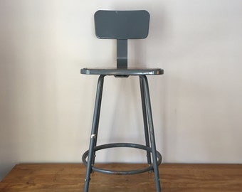 Vintage industrial steel stool in grey - nice worn patina squre seat