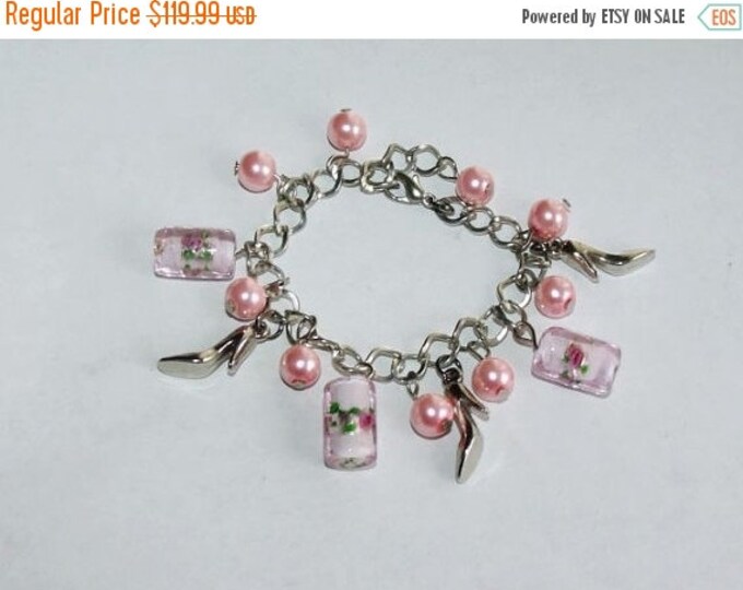 Storewide 25% Off SALE Vintage Silver Tone Designer Charm Bracelet Featuring Assorted Pink Pearls And Silver High Heals Accompanied By Cryst