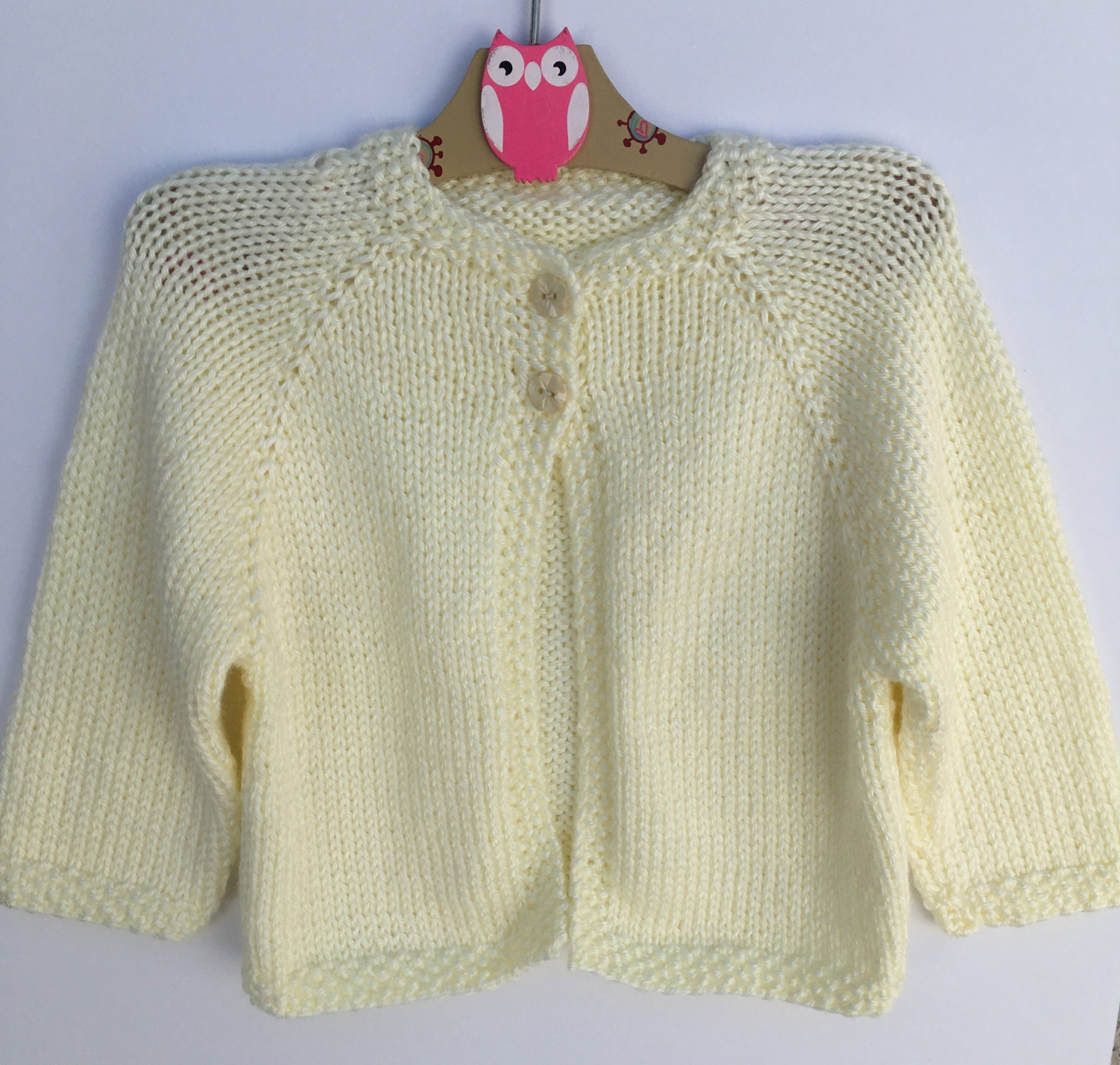 SALE: Children's sweater. Soft pale yellow cardigan.