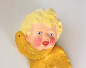 Hand painted plaster cherub wall hanging