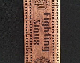 Fighting Sioux cribbage board