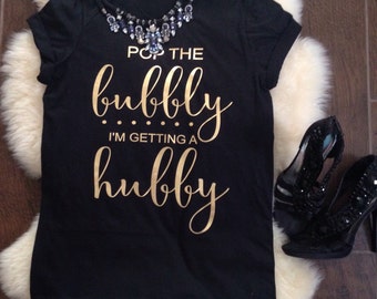 Pop the Bubbly I'm Getting a Hubby Unisex Tshirt in Gold Text