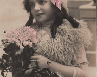 Pink ribbons, white fur stole, pretty girl, ringlets, winter scene, vintage girl, real photo, hand tinted, pink sepia white (rppc/ch452)