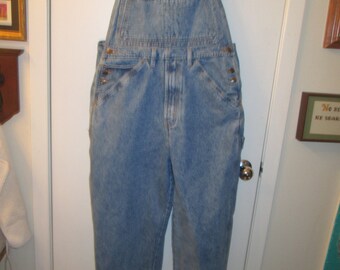 Vintage Jordache blue denim bib overalls. Carpenter style. Size XL. Excellent vintage condition.