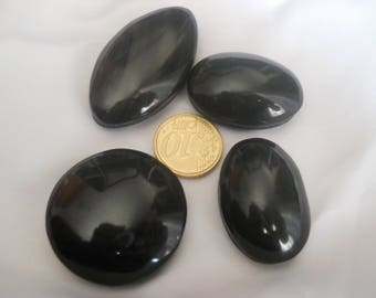 Grooved obsidian cabochons lot. 4 pieces. Sizes from 34 to 46mm.