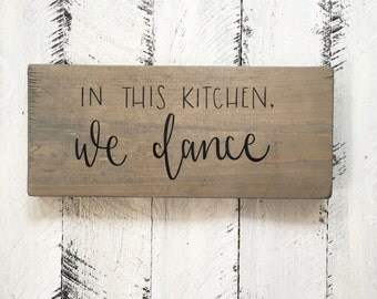 In This Kitchen, We Dance - Wood Sign
