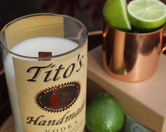 Tito's Vodka label on XL long-burning soy candle in Ginger Lime scent from repurposed bottle with a crackling wood wick
