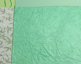 Lot of 22 green scrapbook paper