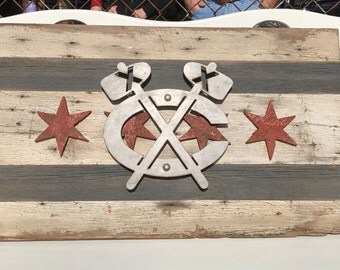 Vintage Blackhawks logo on wooden Chicago flag