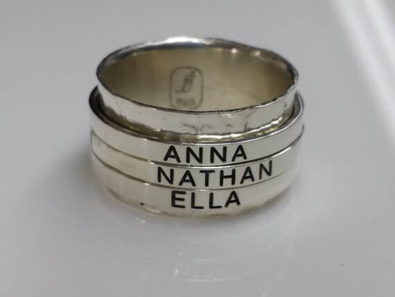 Spinner ring. Sterling silver main ring with 3 custom engraved spinners. Completely customized, personalized, and unique.