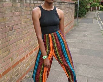 Authentic vintage black coloured pants jump suit.