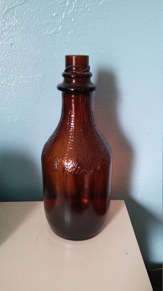 1976 Owens Illinois Glass Co Brown or Amber Bottle Wood