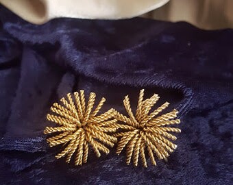 1980s gold tone starburst clip on earrings