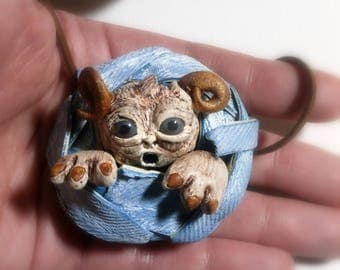 Clay monster necklace polymer clay horned creature in denim rag ball dark brown faux suede cord sliding knots adjustable length