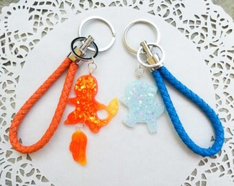 portachiave in ecopelle charmander e squirtle pokemon glow in the dark kawaii
