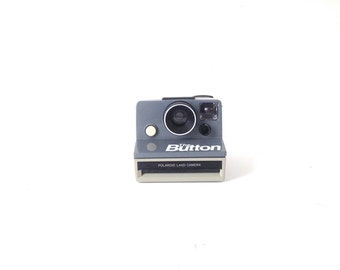 POLAROID camera THE BUTTON vintage grey on grey Sx-70 camera