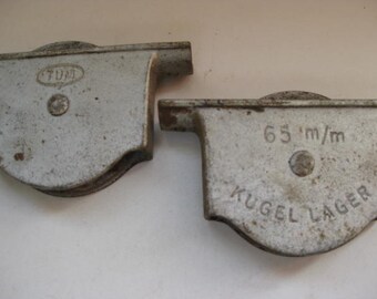 2 German metal pulleys made by TUM.