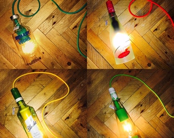 Stylish bottle lamp with coloured textile cable