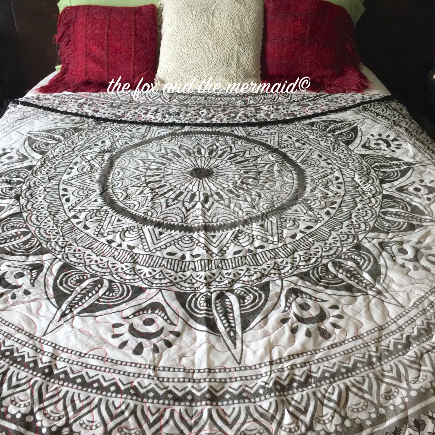 Round mandala quilt with pompoms and matching pillow