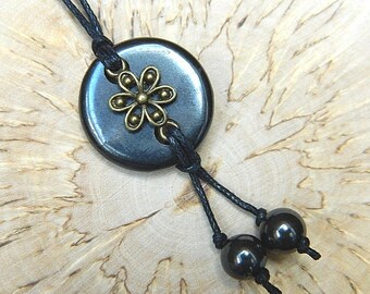 Shungite pendant "Circle with the flower" EMF protection from Karelia