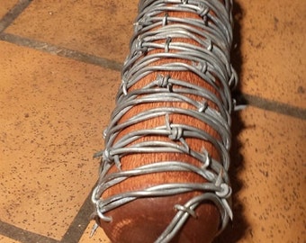 Negan's Lucille barbed wire wrapped bat replica from The Walking Dead