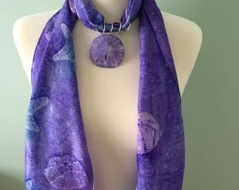 Genuine sand dollar scarf ring in purple
