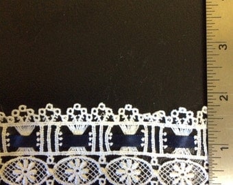 2 yds of white lace with satin ribbon insert