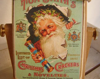 Vintage Christmas crackers & novelties advertising image on wooden tag with string to hang on tree or dresser