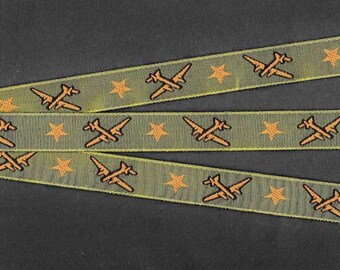 Jacquard Ribbon Trim, Poly, 5/8" Wide, NOVELTY, Olive Green Background with Carmel Brown Airplanes and Stars, Black Accents, Priced Per Yard